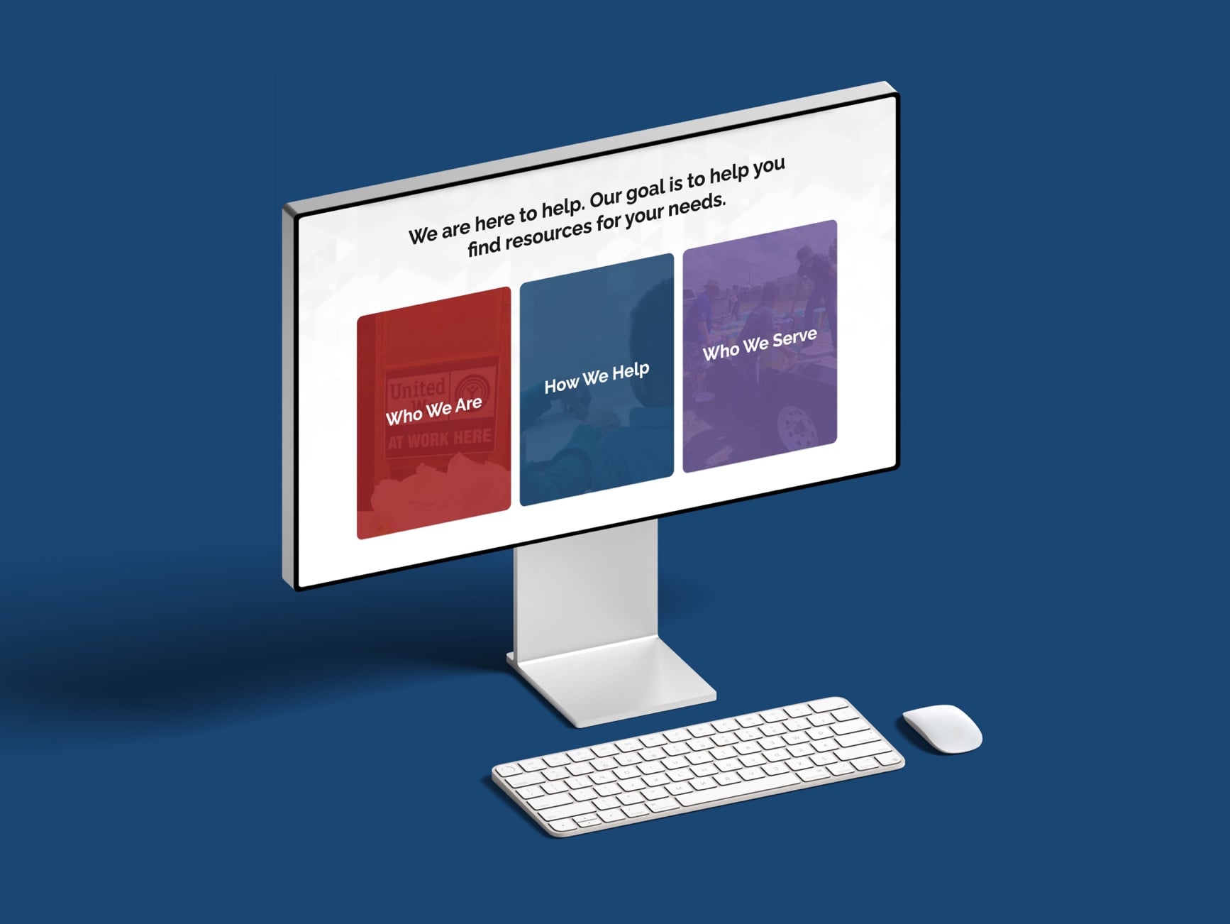 Monitor shows three boxes: Who We Are, How We Help, Who We Serve, and text 'We are here to help.' Keyboard and mouse.