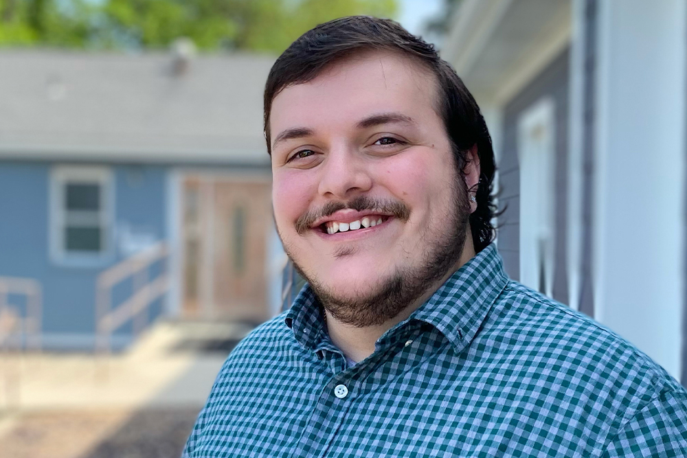 A photo of Ryan Berger, digital content producer at Rooted Web