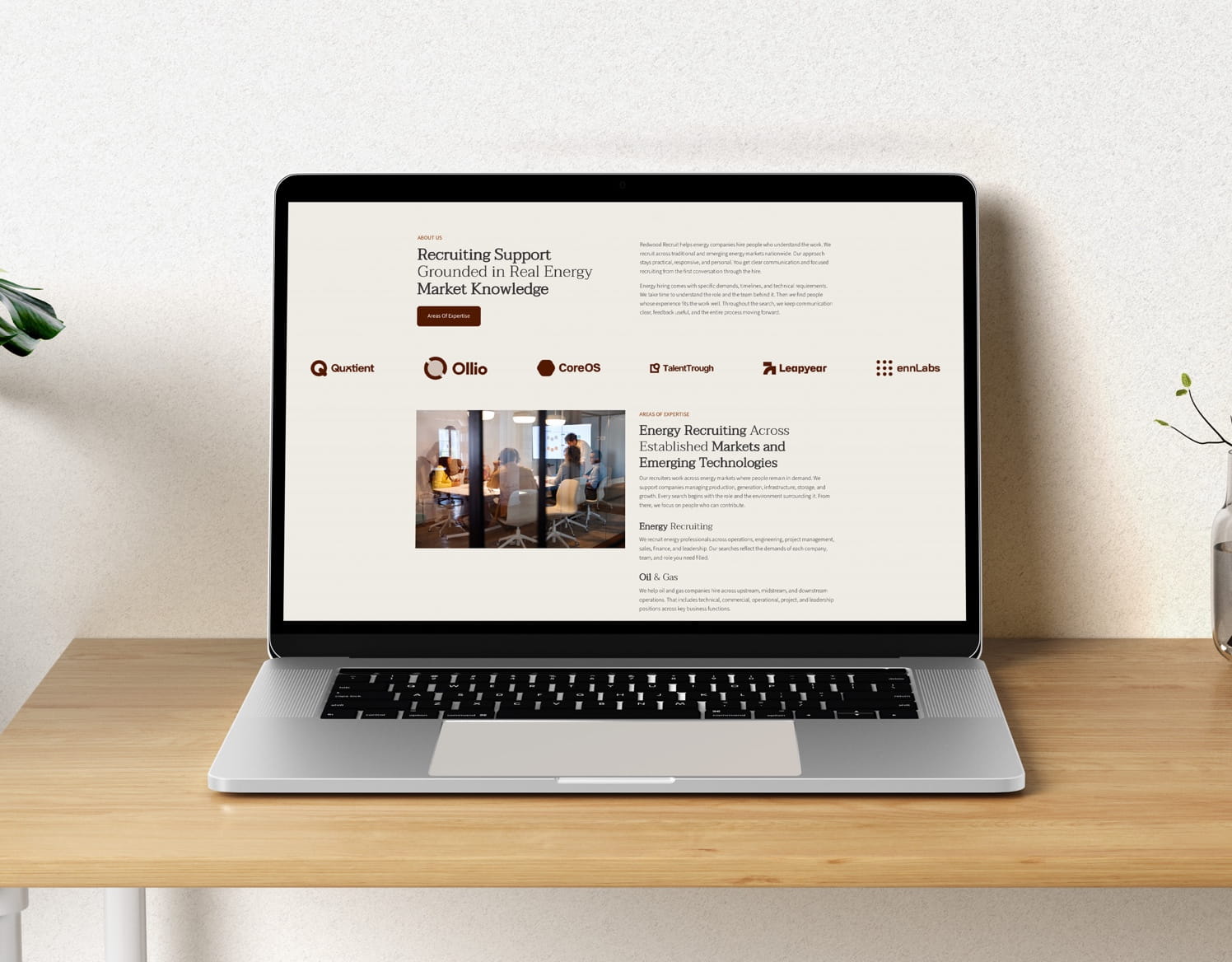 Laptop displaying website for Reducal Recruit, an energy industry recruitment firm.